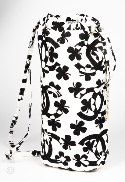 CHANEL BEACH BAG in canvas with a logo and printed clovers to be worn as a duffel...