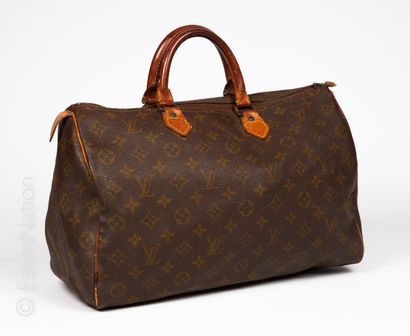 LOUIS VUITTON circa 1975/80 BAG "SPEEDY" 35 cm in Monogram canvas and natural leather,...