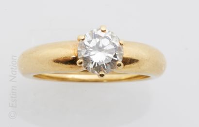 Bague solitaire Solitaire ring in 18K (750°/00) yellow gold set with a modern round...