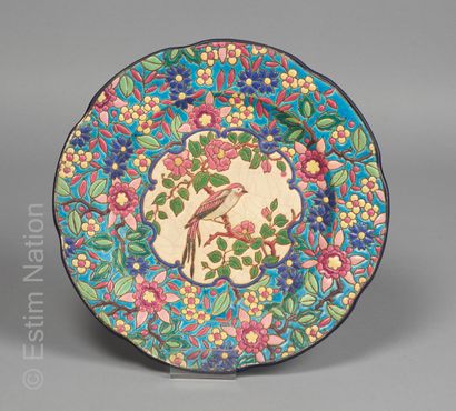 LONGWY LONGWY



Earthenware plate with a moving rim with polychrome decoration called...
