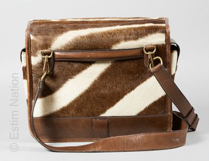HERMES PARIS (1964) Rare hunting pouch in chocolate Courchevel leather and zebra...