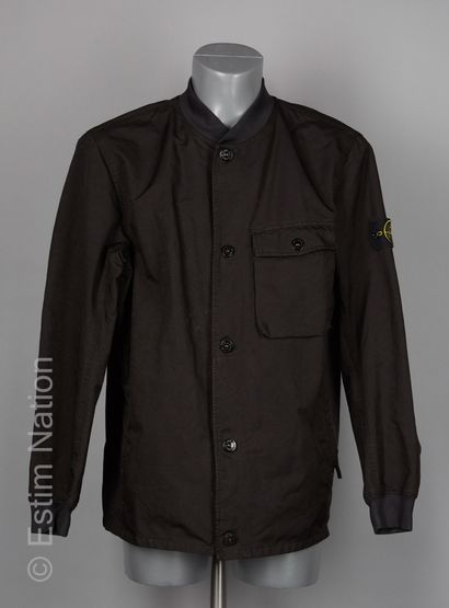 Stone Island VESTE en polyester noir, poignets et col élastiques, trois poches dont...