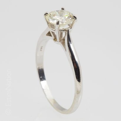 SOLITAIRE Solitaire ring in 14K (585°/00) white gold set with a modern round brilliant-cut...
