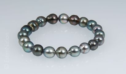 BRACELET PERLES TAHITI Bracelet composé de 20 perles de Tahiti montées sur élastique....