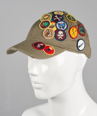 DSQUARED2, LULULEMON TWO CAPS: the first one in khaki canvas embroidered with patches...