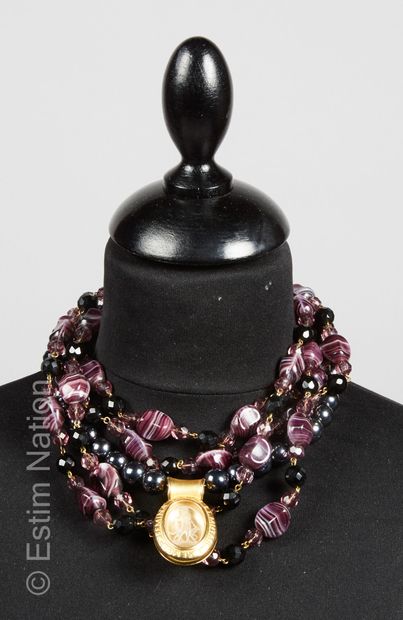 Loris AZZARO NECKLACE with four strings of faceted purple glass beads (signed on...
