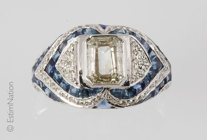 BAGUE OR GRIS DIAMANTS ET SAPHIRS Ring in white gold 14K (585 thousandths), ornamented...