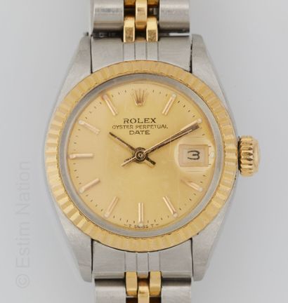 ROLEX - OYSTER PERPETUAL DATE LADY REFERENCE 6917 
Montre de dame en acier et or...