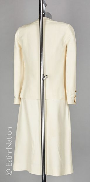 CHANEL BOUTIQUE Vintage ivory silk outfit: double breasted jacket, four pockets of...