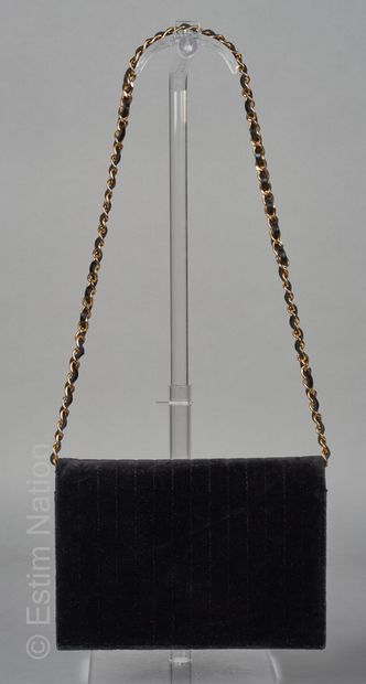 CHANEL circa 1986 
BAG with flap in black overstitched velvet, lining in ottoman...
