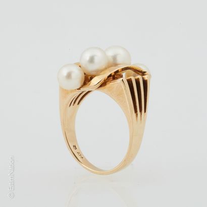 BAGUE OR PERLES Ring in 14K yellow gold (585°/00) with four cultured pearls. Mid...