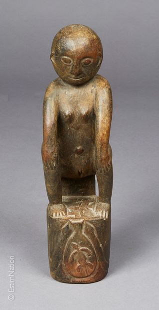 IRIAN JAYA - ASMAT IRIAN JAYA - ASMAT



Crouching female figure in carved wood resting...