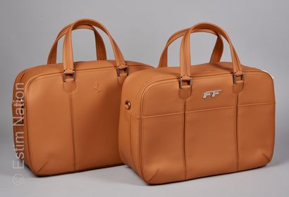SCHEDONI POUR FERRARI FF CIRCA 2011/2016 
Pair of luggage in gold calfskin with shoulder...