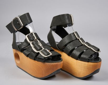 JUNYA WATANABE COMME DES GARCONS Pair of Geta-inspired shoes in wood and black leather...