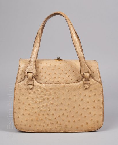 GUCCI DEBUT 1970 BAG in beige shiny ostrich, lining in peccary with a zipped pocket...