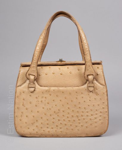 GUCCI DEBUT 1970 BAG in beige shiny ostrich, lining in peccary with a zipped pocket...