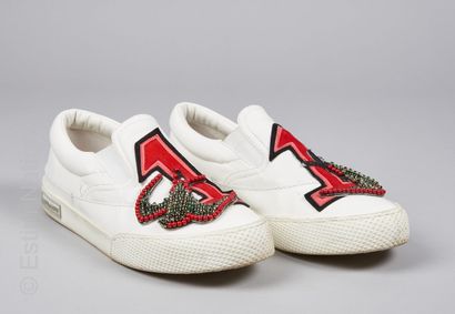 MIU MIU Pair of white leather SLEEPERS, skin patch, embroidered swallows in pearls...
