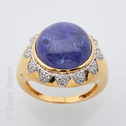 BAGUE ARGENT, TANZANITE ET ZIRCONS Bague en vermeil ( 925 millièmes) ornée d'une...