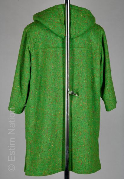 YVES SAINT LAURENT VARIATION Hooded duffle coat in mottled wool tweed on a green...