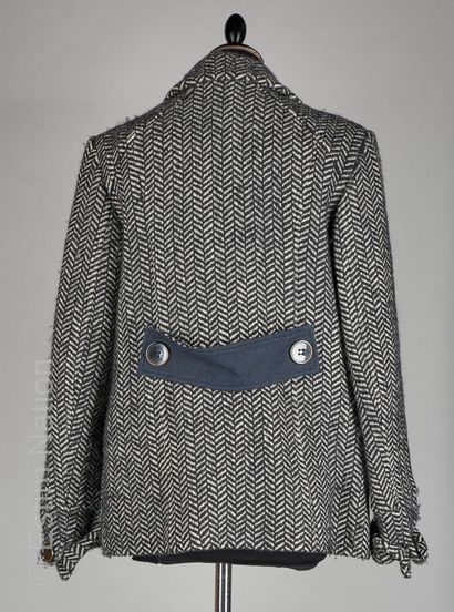 KENZO Black and white herringbone wool jacket, two flap pockets, one of which is...