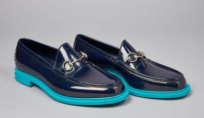 GUCCI Pair of "Baxton" boat moccasins in navy rubber, turquoise soles, uppers decorated...