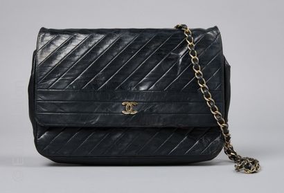 CHANEL CIRCA 1970 BAG with flap in black bias stitched leather, lining in ottoman...