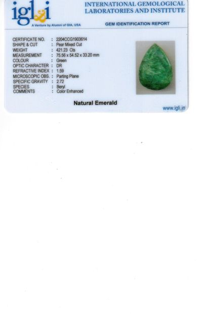 UNE RACINE DE RUBIS SUR PAPIER ET EXAMEN An emerald root on paper of pear shape faceted....