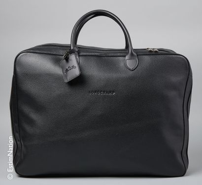 LONGCHAMP WEEKEND BAG in black grained calfskin, signed canvas lining with straps,...