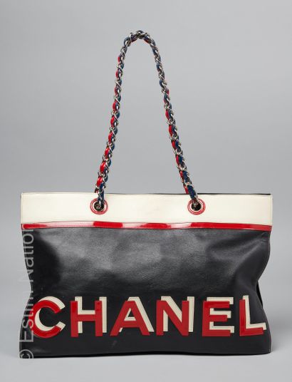 CHANEL (2002/2003) CABAS in black, white and red calfskin embellished with a blue...