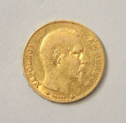 NUMISMATIQUE Pièce de 20 francs or Napoléon III tête nue. 1860

Poids: 6.4g