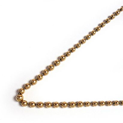 COLLIER OR COLLIER articulé composé d'un rang de perles d'or jaune 18k (7500/00)...