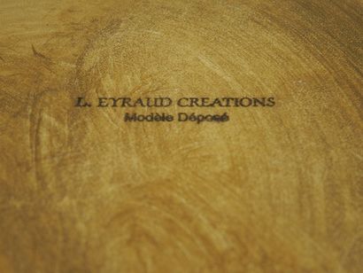 MIROIR LIDYE EYRAUD CREATIONS Miroir de couleur or sur fond rouge. Signé L. EYRAUD...