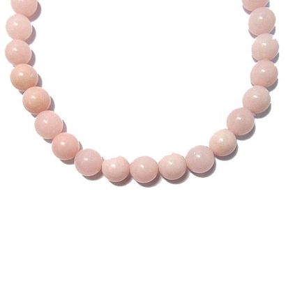 COLLIER COLLIER composé d'un rang de perles de jaspe rose d'environ 14 mm; fermoir...