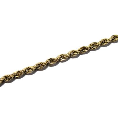 Bracelet BRACELET souple en or jaune 18k (750/°°), à décor de torsade partiellement...