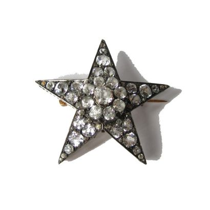 BROCHE ARGENT BROCHE en argent (925/°°) et or rose 18k (750/°°), stylisant une étoile...