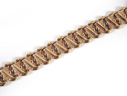 Bracelet BRACELET articulé en alliage d'or 14k (585/°°), à décor géométrique estampé;...