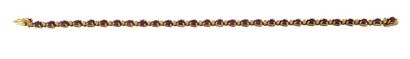 BRACELET RUBIS Bracelet articulé en or jaune 18K 750/°° agrémenté de petits rubis...