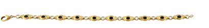 BRACELET SAPHIRS Bracelet articulé en or jaune 18K 750/°° orné de saphirs ovales...