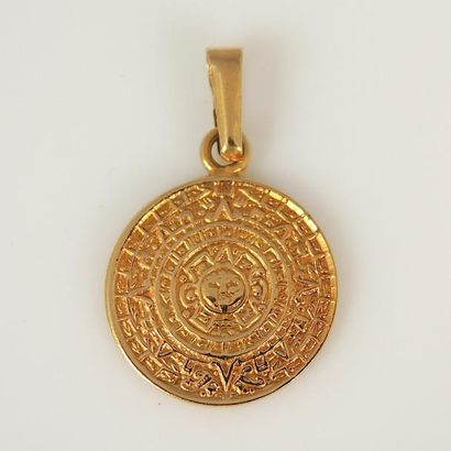 MEDAILLE OR. MEXIQUE Médaille ronde en or 14K (585°/00) à motif aztèques.

Travail...