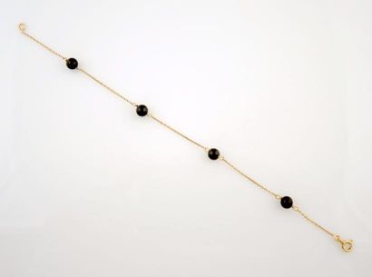 Bracelet Bracelet en or jaune 18K 750/°° maille jaseron orné de 4 perles de couleur...