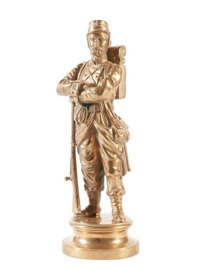 D'après Charles ANFRIE 'Soldat bras croisés''. Sculpture en bronze doré. Ht. Avec...