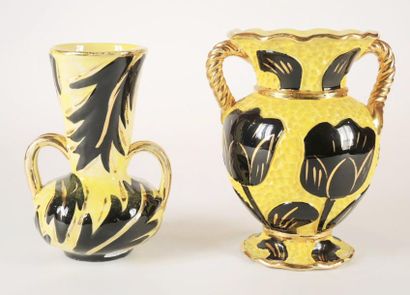 VALLAURIS Deux vases à deux anses dorés à fond jaune et à décor noir et or de feuilles....