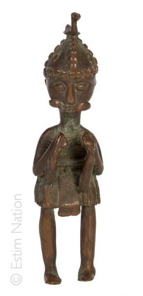 STATUETTE Bronze : personnage casqué surmonté d'un oiseau.


Afrique XXème siècle.


Haut....