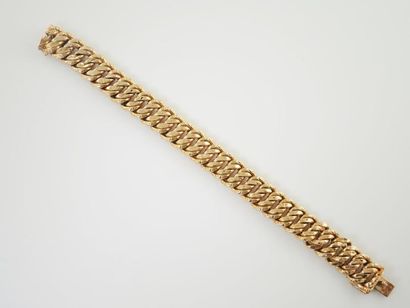 BRACELET GOURMETTE EN OR Bracelet à maille gourmette américaine en or jaune 18K (750°/00),...