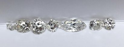 DIAMANTS, SOIT 1,55 CARAT EN TOTALITÉ Ensemble de diamants sur papier pesant en tout...