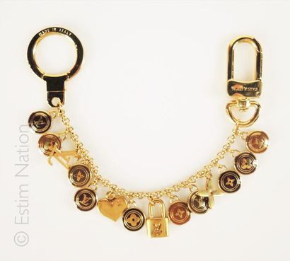 LOUIS VUITTON BRACELET pouvant être porté en bijou de sac ou porte-clés en métal...