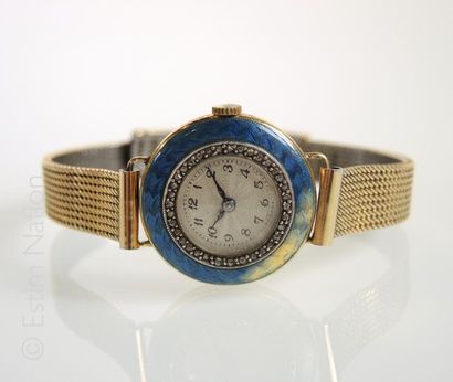 MONTRE DE DAME Petite montre bracelet de dame en or jaune 18K (750/°°) boitier rond...