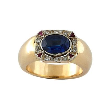 Bague Bague en or jaune 18K 750/°° centrée d'une pierre bleue ovale facettée dans...