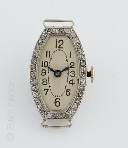 MONTRE DE DAME Boitier de montre de dame en platine et or 18K (750/°°) de forme tonneau,...