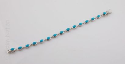 BRACELET TURQUOISES Bracelet articulé en argent (925/°°) rehaussé de petits cabochons...